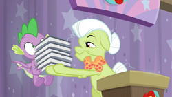 Size: 1600x900 | Tagged: safe, screencap, character:granny smith, character:spike, species:dragon, episode:a trivial pursuit, g4, my little pony: friendship is magic, curtains, flying, notepad, podium, stack, winged spike