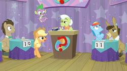 Size: 1366x766 | Tagged: safe, screencap, character:applejack, character:doctor whooves, character:granny smith, character:matilda, character:rainbow dash, character:spike, character:time turner, species:dragon, episode:a trivial pursuit, g4, my little pony: friendship is magic, bell, card, curtains, podium, question mark, table, whistling, winged spike