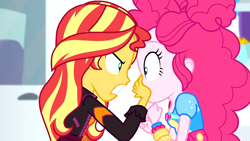 Size: 1916x1080 | Tagged: safe, screencap, character:pinkie pie, character:sunset shimmer, equestria girls:sunset's backstage pass, g4, my little pony:equestria girls, angry, duo, duo female, female, geode of empathy, geode of sugar bombs, hand over mouth, looking at each other, magical geodes, shrunken pupils