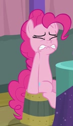 Size: 584x998 | Tagged: safe, screencap, character:pinkie pie, species:pony, episode:a trivial pursuit, g4, my little pony: friendship is magic, cropped, lip bite, out of context, sitting, solo