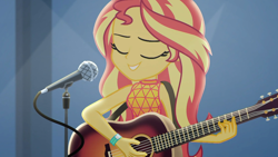 Size: 1910x1074 | Tagged: safe, screencap, character:sunset shimmer, episode:let it rain, g4, my little pony:equestria girls, acoustic guitar, beautiful, eyes closed, female, guitar, microphone, microphone stand, musical instrument, singing, smiling