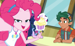 Size: 1175x720 | Tagged: safe, screencap, character:pinkie pie, character:timber spruce, character:twilight sparkle, character:twilight sparkle (scitwi), species:eqg human, episode:do it for the ponygram!, g4, my little pony:equestria girls, clothing, cupcake, female, food, frosting, geode of sugar bombs, geode of telekinesis, lemon drop cupcake, magic cupcake touch, magical geodes, male, smiling, table