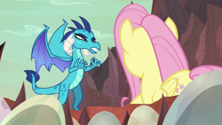 Size: 1920x1080 | Tagged: safe, screencap, character:fluttershy, character:princess ember, species:dragon, species:pegasus, species:pony, episode:sweet and smoky, g4, my little pony: friendship is magic, dragon egg, dragoness, duo, female, mare, narrowed eyes