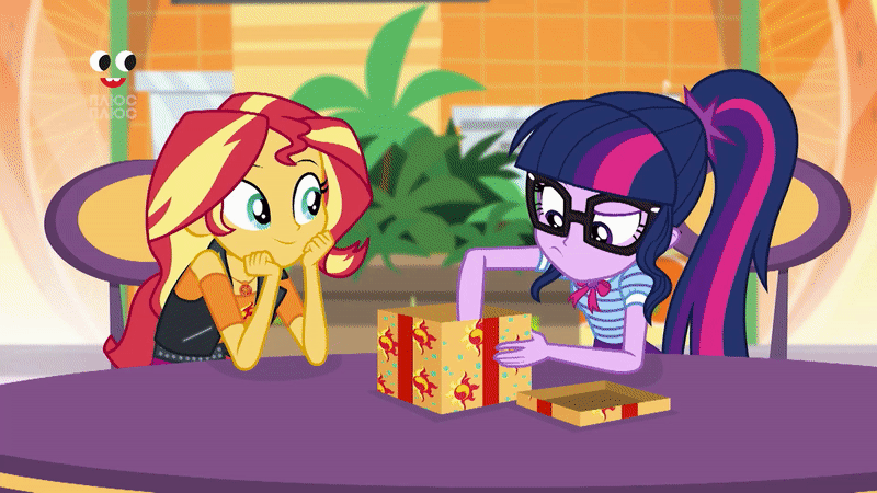 Size: 800x450 | Tagged: safe, screencap, character:sunset shimmer, character:twilight sparkle, character:twilight sparkle (scitwi), species:eqg human, species:parrot, equestria girls:holidays unwrapped, g4, my little pony:equestria girls, animated, arm around back, chair, geode of empathy, geode of telekinesis, gif, gift box, glasses, hand on shoulder, hug, laughing, magical geodes, photo, plushie, plusplus, present, pulling, shipping fuel, shopping mall, smiling, table