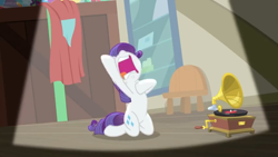 Size: 1600x900 | Tagged: safe, screencap, character:rarity, species:pony, episode:dragon dropped, g4, my little pony: friendship is magic, chair, crate, drama queen, dramatic lighting, gramophone, hoof on chest, kneeling, marshmelodrama, solo, spotlight