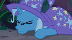 Size: 1280x720 | Tagged: safe, screencap, character:trixie, species:pony, species:unicorn, episode:student counsel, cape, clothing, eyes closed, female, forest, hat, mare, prone, solo, spitting, trixie's cape, trixie's hat