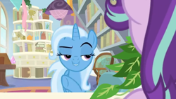 Size: 1600x900 | Tagged: safe, screencap, character:phyllis, character:starlight glimmer, character:trixie, species:pony, species:unicorn, episode:a horse shoe-in, g4, my little pony: friendship is magic, book, bookshelf, ceiling light, desk, female, globe, house plant, lidded eyes, mare, office, philodendron, potted plant, raised eyebrow, raised hoof, scroll, shelf, window