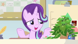 Size: 1600x900 | Tagged: safe, screencap, character:octavia melody, character:phyllis, character:starlight glimmer, species:pony, species:unicorn, episode:a horse shoe-in, g4, my little pony: friendship is magic, bulletin board, chart, desk, female, house plant, inkwell, mare, nervous grin, office, philodendron, photo, quill, shrug
