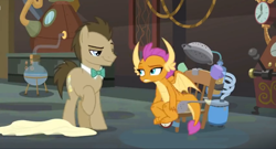 Size: 1600x866 | Tagged: safe, screencap, character:doctor whooves, character:smolder, character:time turner, species:dragon, species:earth pony, species:pony, episode:a horse shoe-in, g4, my little pony: friendship is magic, blanket, bored, bow tie, chair, chamber, claws, clock, colander, confident, cup, duct tape, duo, failure, flask, horns, jar, laboratory, ladle, lidded eyes, male, mug, narrowed eyes, raised eyebrow, raised hoof, smiling, smirk, smolder is not amused, spread wings, stallion, tape, teenaged dragon, teenager, unamused, underfoot, unimpressed, vacuum cleaner, wings