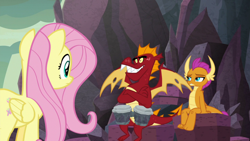 Size: 1920x1080 | Tagged: safe, screencap, character:fluttershy, character:garble, character:smolder, species:dragon, species:pegasus, species:pony, episode:sweet and smoky, g4, my little pony: friendship is magic, bongos, crossed arms, dragoness, female, male, mare, rock, trio