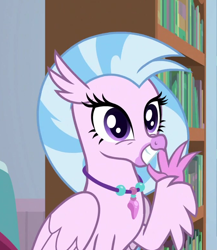 Size: 676x780 | Tagged: safe, screencap, character:silverstream, species:classical hippogriff, species:hippogriff, episode:a horse shoe-in, g4, my little pony: friendship is magic, bookshelf, claws, cropped, cute, diastreamies, female, folded wings, grin, jewelry, looking at you, necklace, pearl necklace, sitting, smiling, solo, squee, talons, teenager, waving, wings
