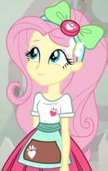 Size: 444x701 | Tagged: safe, screencap, character:fluttershy, episode:good vibes, eqg summertime shorts, g4, my little pony:equestria girls, apron, bow, clothing, cropped, cute, female, hairband, hairclip, looking up, paw prints, pleated skirt, shirt, short sleeves, shyabetes, skirt, smiling, solo