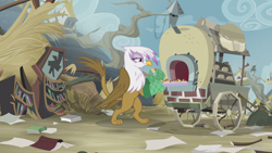 Size: 2100x1181 | Tagged: safe, screencap, character:gilda, species:griffon, episode:the lost treasure of griffonstone, g4, my little pony: friendship is magic, bipedal, book, bookshelf, cart, cooking, disrepair, eating, female, folded wings, griffon scone, griffonstone, library, lidded eyes, litter, oven mitts, paws, puffy cheeks, raised tail, scone, solo, tail, tasting, wings