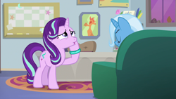 Size: 1920x1080 | Tagged: safe, screencap, character:starlight glimmer, species:pony, species:unicorn, episode:student counsel, bracelet, couch, female, floppy ears, jewelry, mare, open mouth, raised hoof, solo, starlight's office