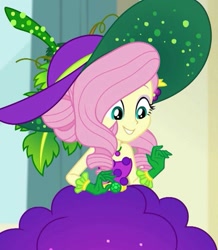 Size: 943x1080 | Tagged: safe, screencap, character:fluttershy, equestria girls:holidays unwrapped, g4, my little pony:equestria girls, bare shoulders, belt, clothing, cornucopia costumes, costume, cropped, cute, dress, food, geode of fauna, gloves, grapes, hat, huggable, jewelry, leaf, looking down, magical geodes, necklace, o come all ye squashful, shyabetes, sleeveless, smiling, solo, vine