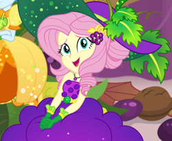 Size: 1320x1080 | Tagged: safe, screencap, character:fluttershy, character:rainbow dash, equestria girls:holidays unwrapped, g4, my little pony:equestria girls, bare shoulders, belt, clothing, cornucopia costumes, costume, cropped, cute, dress, female, food, geode of fauna, gloves, grapes, hairclip, hat, huggable, jewelry, leaf, looking at you, looking up at you, magical geodes, necklace, shyabetes, sitting, sleeveless, smiling