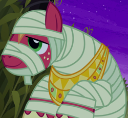 Size: 1076x996 | Tagged: safe, screencap, character:big mcintosh, species:earth pony, species:pony, episode:scare master, g4, my little pony: friendship is magic, clothing, corn, costume, cropped, food, jewelry, mummy costume, mummy mac, necklace, nightmare night, nightmare night costume