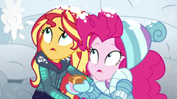 Size: 1920x1080 | Tagged: safe, screencap, character:pinkie pie, character:sunset shimmer, equestria girls:holidays unwrapped, g4, my little pony:equestria girls, clothing, duo, female, jacket, mittens, ramekin, saving pinkie's pie, snow, snow fort, snowball fight, souffle, winter hat, winter jacket, winter outfit