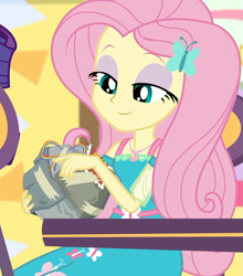 Size: 949x1080 | Tagged: safe, screencap, character:fluttershy, equestria girls:holidays unwrapped, g4, my little pony:equestria girls, bad gift wrapping, burger, canterlot mall, chair, clothing, cropped, cute, dashing through the mall, dress, female, flower, food, geode of fauna, gift giving, gift wrapped, hairclip, jewelry, magical geodes, mall, necklace, present, shyabetes, sitting, stamp, table, waistband