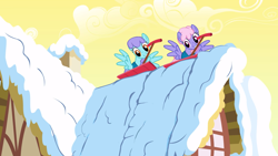 Size: 2880x1619 | Tagged: safe, screencap, character:rainbowshine, species:pegasus, species:pony, episode:winter wrap up, g4, my little pony: friendship is magic, background pony, duo, female, mare, mouth hold, roof, shovel, snow, snow shovel, snowslide, spread wings, weather team, wings, winter wrap up vest