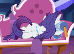 Size: 676x492 | Tagged: safe, screencap, character:rarity, species:pony, species:unicorn, episode:dragon dropped, g4, my little pony: friendship is magic, cropped, fainting couch, female, holding, lying down, mare, marshmelodrama, messy mane, pillow, rarity being rarity, solo
