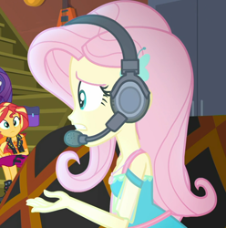 Size: 1072x1080 | Tagged: safe, screencap, character:fluttershy, character:rarity, character:sunset shimmer, episode:costume conundrum, g4, my little pony:equestria girls, cropped, female, gamershy, geode of empathy, geode of fauna, headset, magical geodes, offscreen character, solo focus, stairs, sunset's apartment, worried