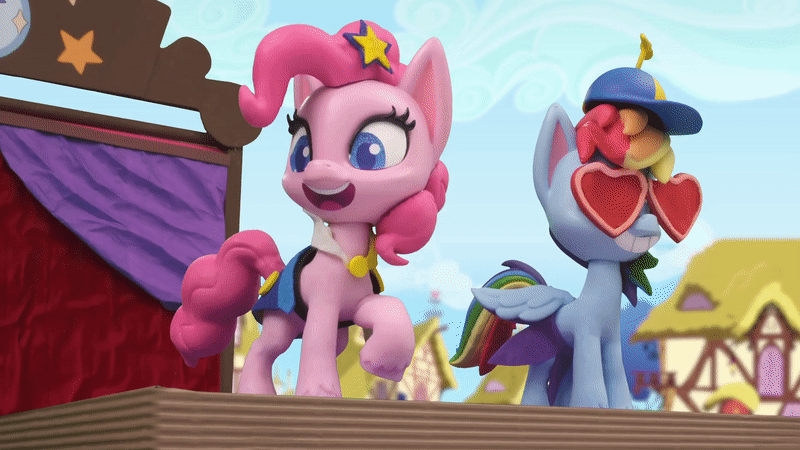 Size: 800x450 | Tagged: safe, screencap, character:pinkie pie, character:rainbow dash, species:earth pony, species:pegasus, species:pony, g4.5, my little pony: stop motion short, my little pony:pony life, animated, clothing, fashion failure, fashion show, gif, hair ornament, hat, pose, rainbow dash always dresses in style, runway, smiling, stage, stop motion, sunglasses