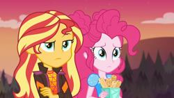 Size: 1920x1080 | Tagged: safe, screencap, character:pinkie pie, character:sunset shimmer, equestria girls:sunset's backstage pass, g4, my little pony:equestria girls, arms folded, churros, clothing, duo, duo female, female, food, jacket, music festival outfit, outdoors, raised eyebrow