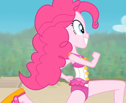 Size: 1319x1080 | Tagged: safe, screencap, character:pinkie pie, equestria girls:forgotten friendship, g4, my little pony:equestria girls, beach, bow tie, clothing, cropped, curly hair, cute, diapinkes, female, flipper, forest, forest background, geode of sugar bombs, legs, magical geodes, outdoors, running, sky, sleeveless, smiling, swimsuit, tree, walkway
