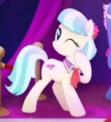 Size: 331x363 | Tagged: safe, screencap, character:coco pommel, character:fashion plate, species:earth pony, species:pony, my little pony: the movie (2017), cocobetes, cropped, cute, female, offscreen character, one eye closed, solo focus, wink