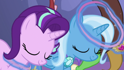 Size: 1280x720 | Tagged: safe, screencap, character:discord, character:starlight glimmer, character:trixie, episode:celestial advice, g4, my little pony: friendship is magic, duo focus, equestrian pink heart of courage, eyes closed, head out of frame, implied princess luna, levitation, magic, offscreen character, telekinesis