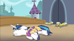 Size: 1921x1078 | Tagged: safe, screencap, character:shining armor, species:pony, species:unicorn, episode:twilight's kingdom, g4, my little pony: friendship is magic, angry, angry eyebrows, armor, bridge, canterlot, clenched teeth, cute, drained, ear down, eyes closed, grimace, high res, laying on stomach, prone, royal guard, royal guard armor, ryona, shining adorable, unconscious, worried