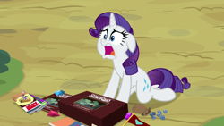 Size: 1920x1080 | Tagged: safe, screencap, character:rarity, episode:dragon dropped, g4, my little pony: friendship is magic, comic book, dice, dungeons and dragons, gem, ogres and oubliettes, solo