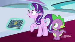 Size: 1280x720 | Tagged: safe, screencap, character:spike, character:starlight glimmer, species:dragon, species:pony, species:unicorn, episode:memories and more, 9now, book, crossed arms, levitation, magic, magic aura, scrapbook, telekinesis, throne room, winged spike