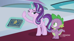 Size: 1280x720 | Tagged: safe, screencap, character:spike, character:starlight glimmer, species:dragon, species:pony, species:unicorn, episode:memories and more, 9now, bedroom eyes, book, crossed arms, duo, levitation, looking at each other, magic, magic aura, scrapbook, telekinesis, winged spike