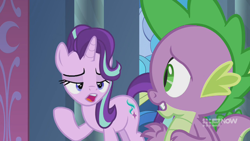 Size: 1280x720 | Tagged: safe, screencap, character:spike, character:starlight glimmer, species:dragon, species:pony, species:unicorn, episode:memories and more, 9now, duo, looking at each other, magic, mid-blink screencap, telekinesis, winged spike