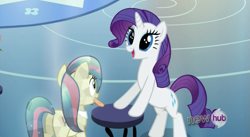 Size: 851x466 | Tagged: safe, screencap, character:bonna fide, character:rarity, species:crystal pony, species:pony, species:unicorn, episode:games ponies play, g4, my little pony: friendship is magic, background pony, crystallized, female, happy, mare, mouth hold, stool
