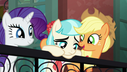 Size: 1280x720 | Tagged: safe, screencap, character:applejack, character:coco pommel, character:rarity, species:earth pony, species:pony, species:unicorn, episode:made in manehattan, g4, my little pony: friendship is magic, applejack's hat, balcony, bipedal, clothing, cowboy hat, female, hat, hoof around neck, mare, stetson