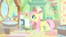 Size: 853x480 | Tagged: safe, screencap, character:fluttershy, character:philomena, species:bird, species:pegasus, species:phoenix, species:pony, episode:a bird in the hoof, g4, my little pony: friendship is magic, bathroom, coughing, duo, female, grin, leaning forward, mare, smiling, steam, towel