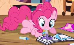 Size: 639x386 | Tagged: safe, screencap, character:pinkie pie, species:earth pony, species:pony, episode:princess twilight sparkle, g4, my little pony: friendship is magic, season 4, coloring, coloring book, crayon, cute, diapinkes, female, get, index get, mare, mouth hold, prone, smiling, solo