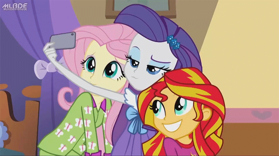 Size: 900x506 | Tagged: safe, screencap, character:fluttershy, character:rarity, character:spike, character:sunset shimmer, species:dog, equestria girls:rainbow rocks, g4, my little pony:equestria girls, animated, harem, phone, photobomb, selfie, spike gets all the mares, spike the dog