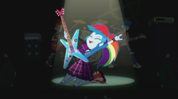 Size: 1260x701 | Tagged: safe, screencap, character:rainbow dash, episode:friendship through the ages, g4, my little pony:equestria girls, background human, crimson napalm, devil horn (gesture), guitar, rainbow punk, thunderbass