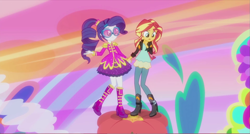 Size: 1363x731 | Tagged: safe, screencap, character:rarity, character:sunset shimmer, episode:friendship through the ages, g4, my little pony:equestria girls, alternate costumes, alternate hairstyle, flower, glasses, holding hands, mod, psychedelic, sgt. rarity
