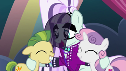 Size: 1600x900 | Tagged: safe, screencap, character:carrot crunch, character:coloratura, character:countess coloratura, character:sweetie belle, species:earth pony, species:pony, species:unicorn, episode:the mane attraction, g4, my little pony: friendship is magic, colt, crunchabetes, cute, diasweetes, female, filly, hug, male, mare, open mouth, rarabetes, smiling