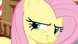 Size: 1600x900 | Tagged: safe, screencap, character:fluttershy, species:pegasus, species:pony, episode:putting your hoof down, g4, my little pony: friendship is magic, devious, female, flutterbitch, grin, mare, new fluttershy, smiling, solo, sugarcube corner