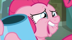 Size: 1577x881 | Tagged: safe, screencap, character:pinkie pie, episode:the gift of the maud pie, g4, my little pony: friendship is magic, debating, faec, floppy ears, hug, lip bite, manehattan, party cannon, sad, sentimental value, solo, sweat