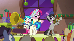 Size: 849x474 | Tagged: safe, screencap, character:dj pon-3, character:octavia melody, character:pinkie pie, character:vinyl scratch, episode:a hearth's warming tail, g4, my little pony: friendship is magic, discovery family logo, phonograph, spirit, spirit of hearth's warming presents, victrola scratch, wax cylinder