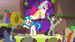 Size: 1280x720 | Tagged: safe, screencap, character:dj pon-3, character:octavia melody, character:pinkie pie, character:vinyl scratch, episode:a hearth's warming tail, g4, my little pony: friendship is magic, discovery family logo, phonograph, spirit of hearth's warming presents, victrola scratch, violin, wax cylinder