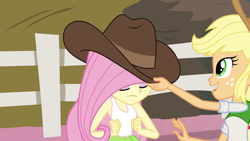Size: 1280x720 | Tagged: safe, screencap, character:applejack, character:fluttershy, episode:shake your tail, equestria girls:rainbow rocks, g4, my little pony:equestria girls, clothing, hat