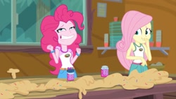 Size: 1187x675 | Tagged: safe, screencap, character:fluttershy, character:pinkie pie, equestria girls:legend of everfree, g4, my little pony:equestria girls, clothing, dough, faec, food, grin, legend of everfree - bloopers, needs more jpeg, sleeveless, smiling, sprinkles, tank top, wat, wtf